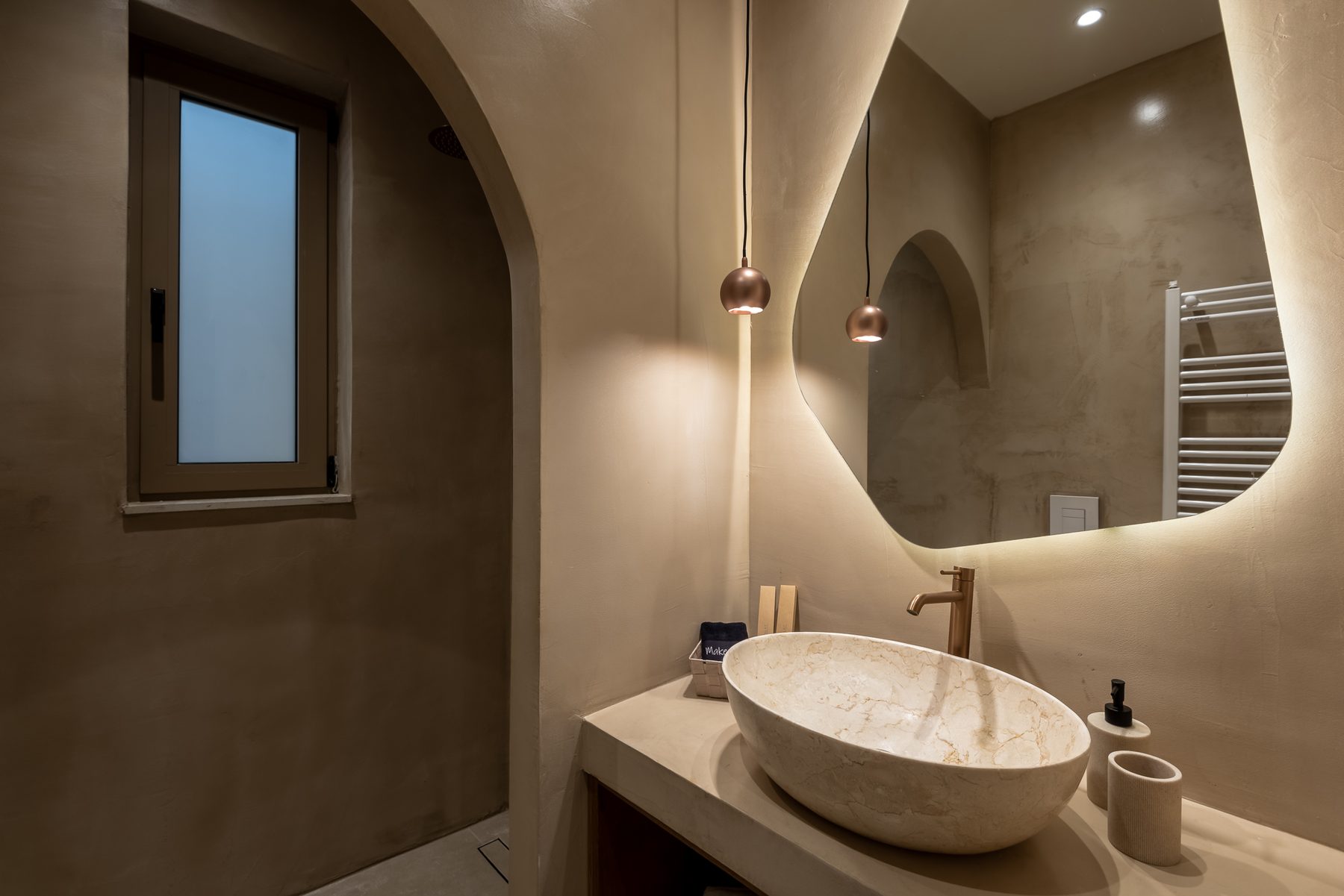 Devina Two — Ensuite 1, natural stone vessel basin and warm finishes
