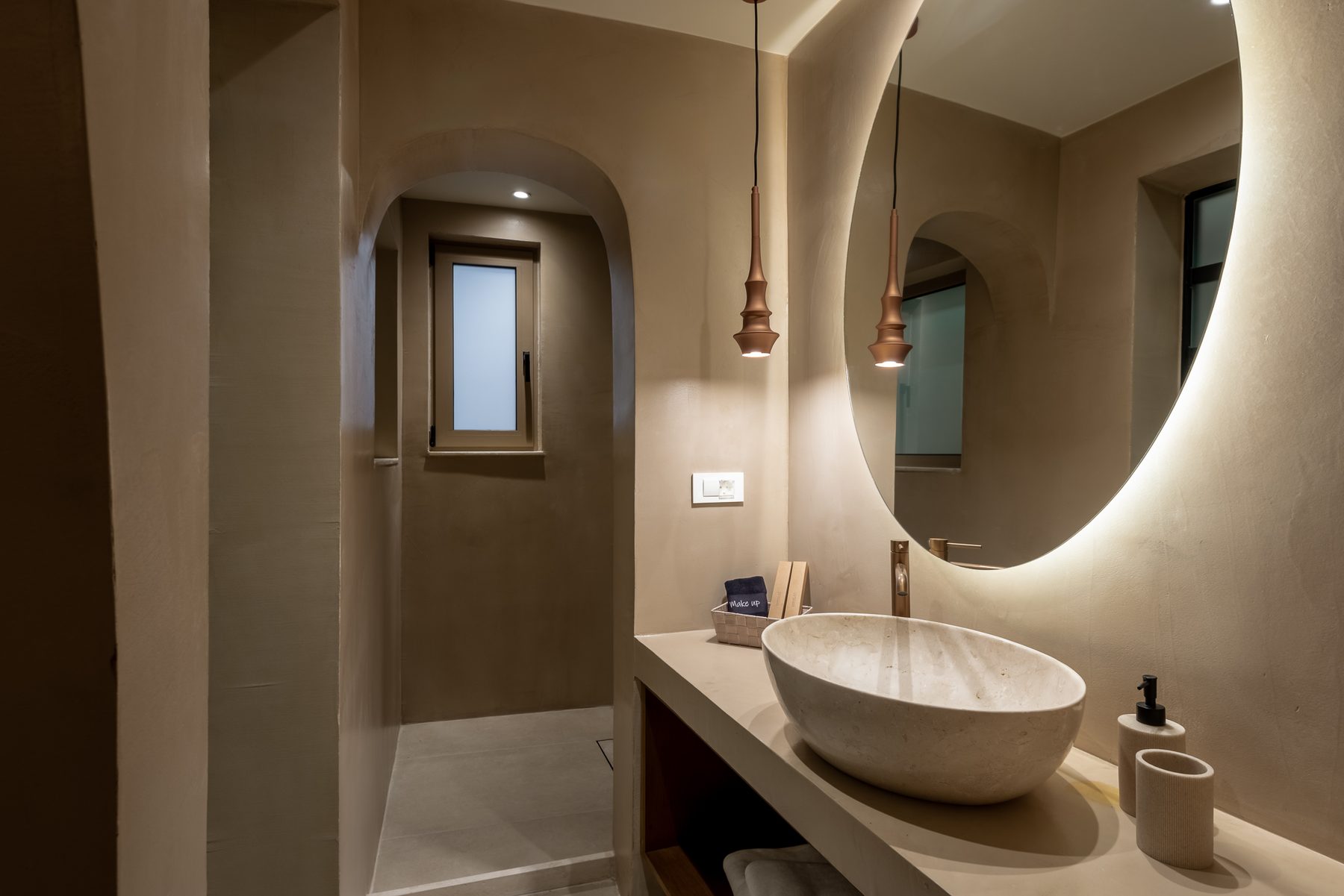 Devina Two — master ensuite with freestanding basin and plaster walls