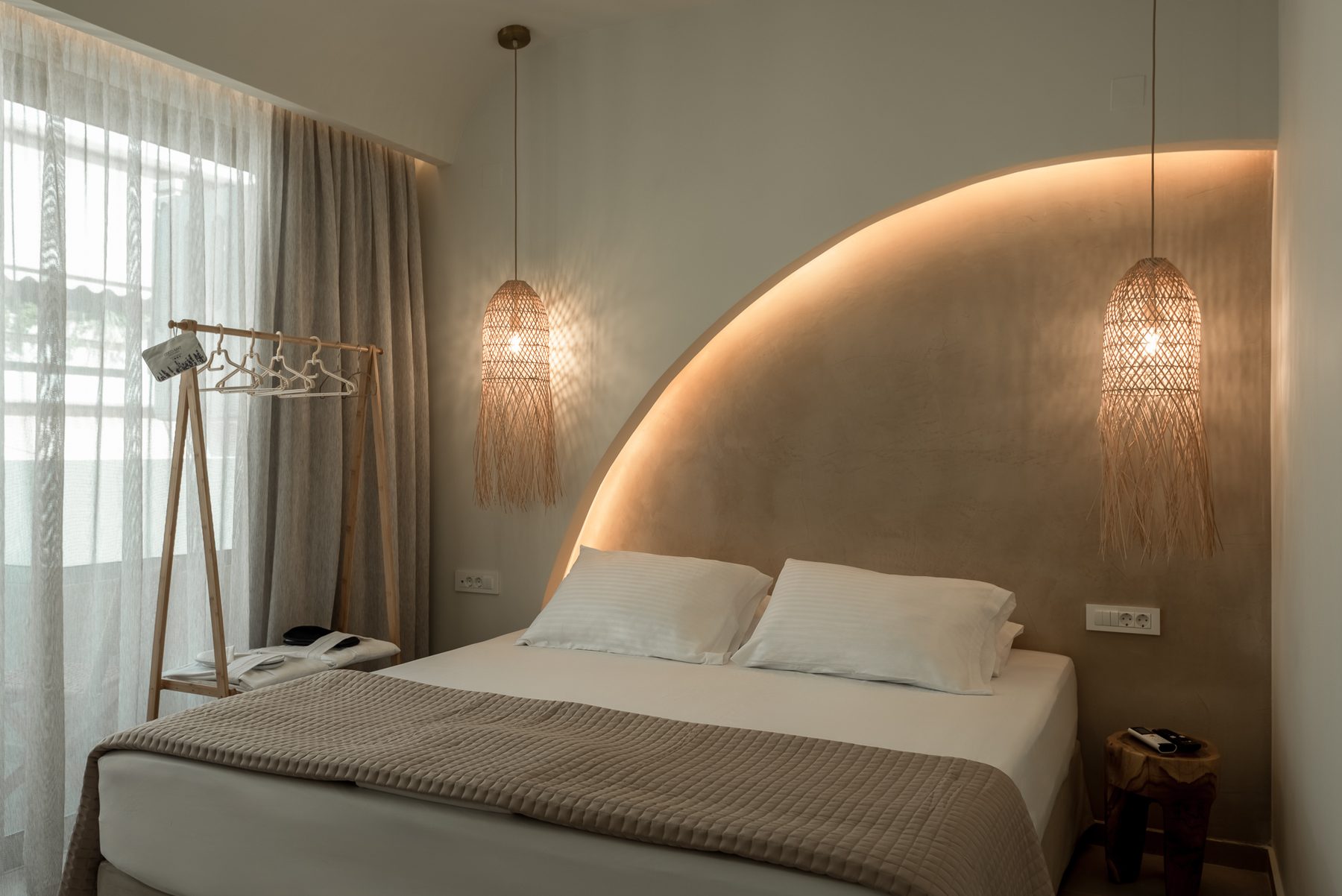 Devina Two — bedroom one detail with natural morning light