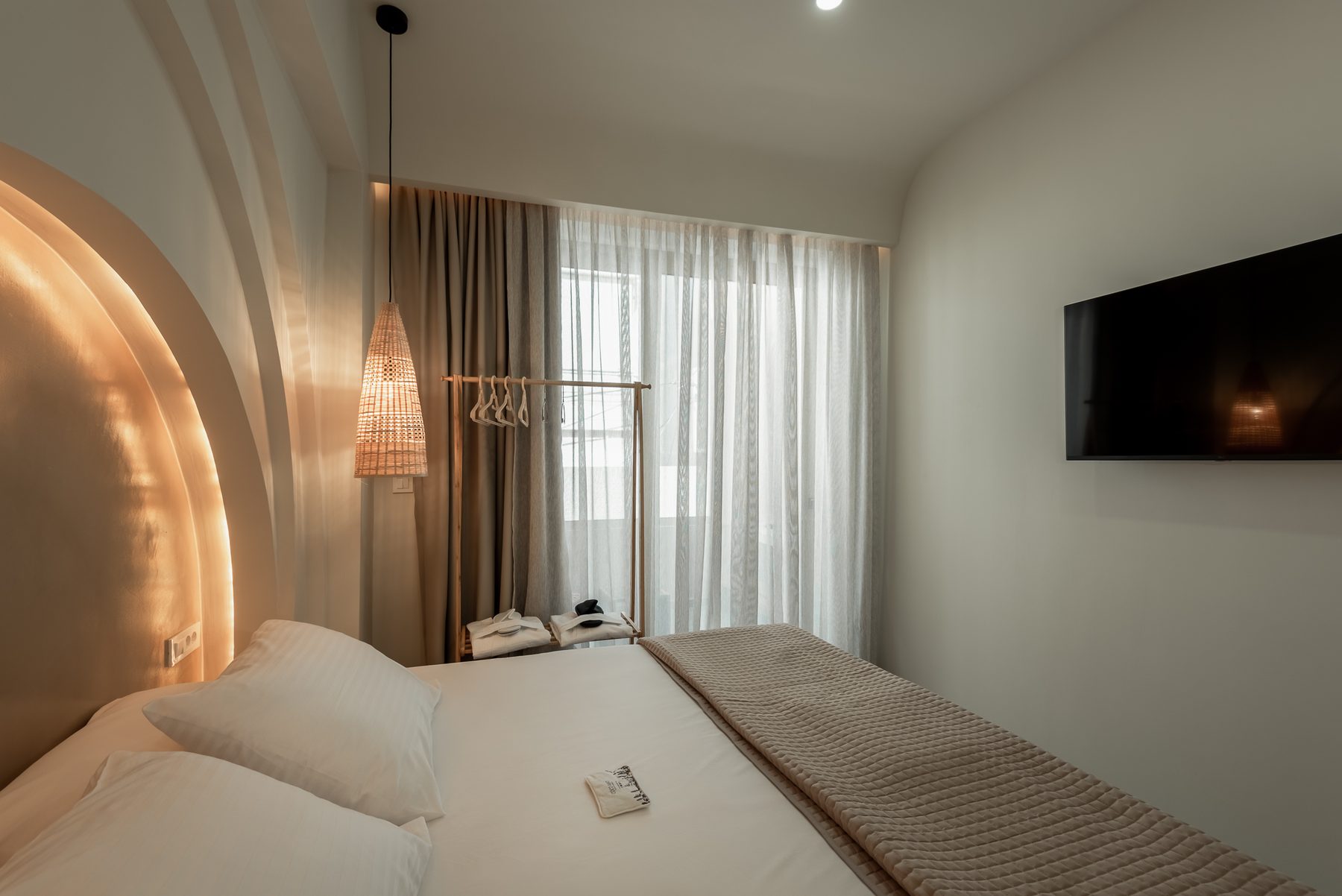 Devina Two — bedroom two with balcony connection and Cretan light
