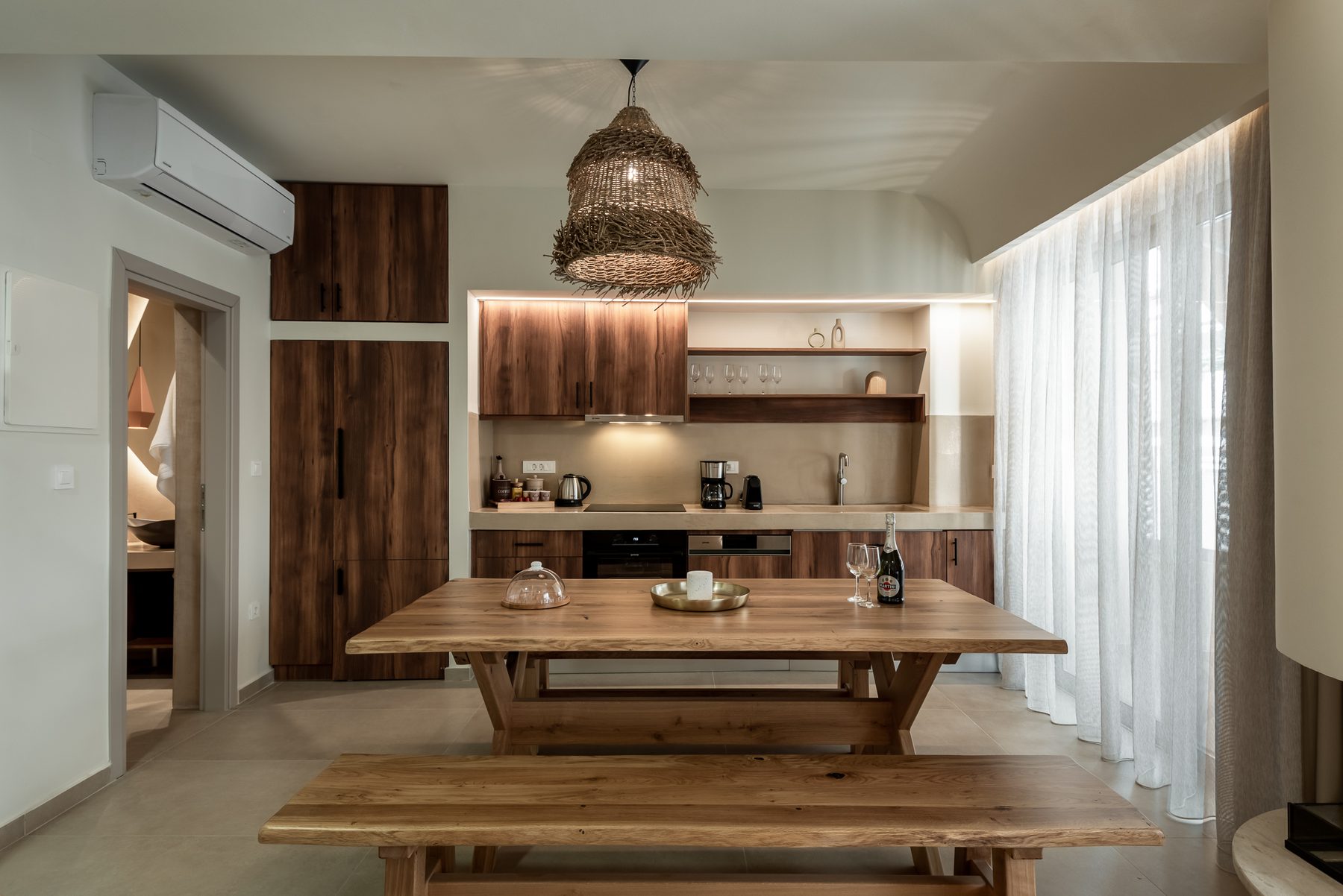 Devina Two — kitchen detail with premium appliances and stone worktop