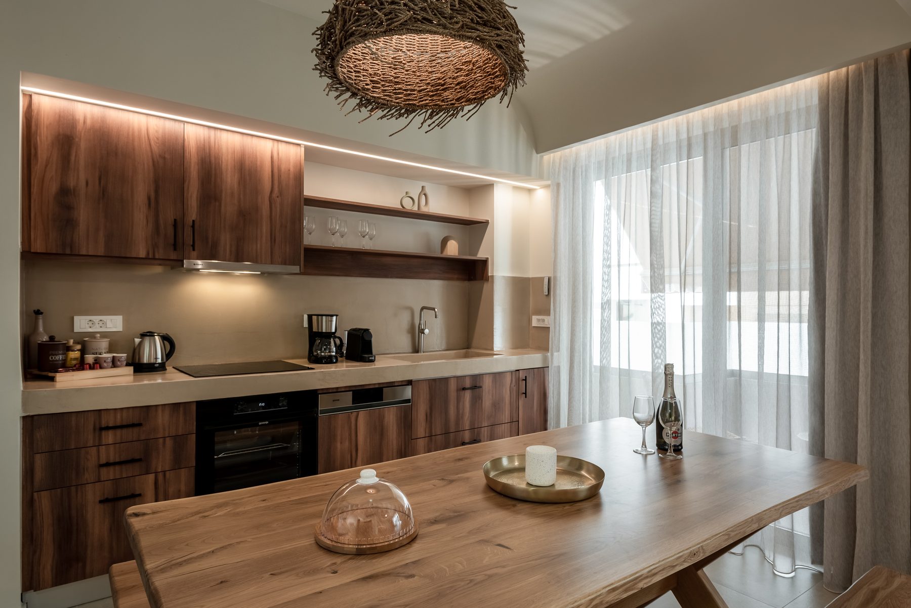 Devina Two — dining area with warm pendant lighting